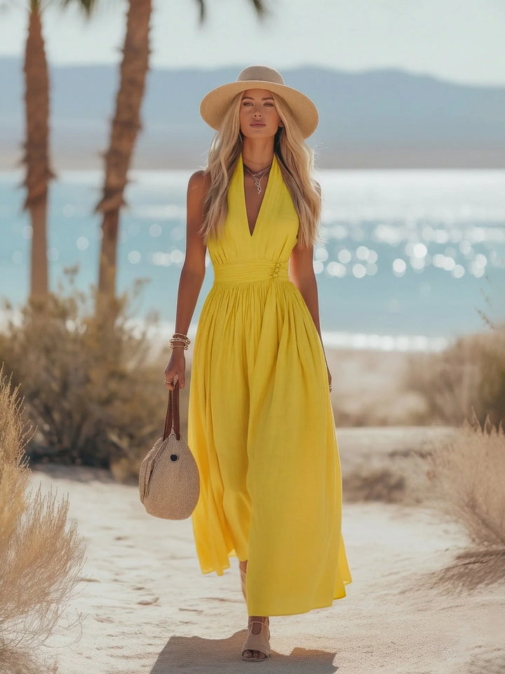 Back view of halter maxi dress showing tie closure and backless design for summer events