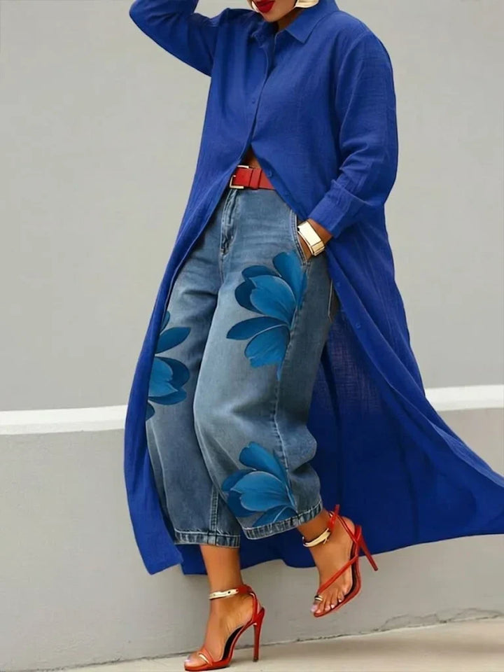 Side view of relaxed fit shirt dress paired with statement floral jeans in coordinated two-piece set
