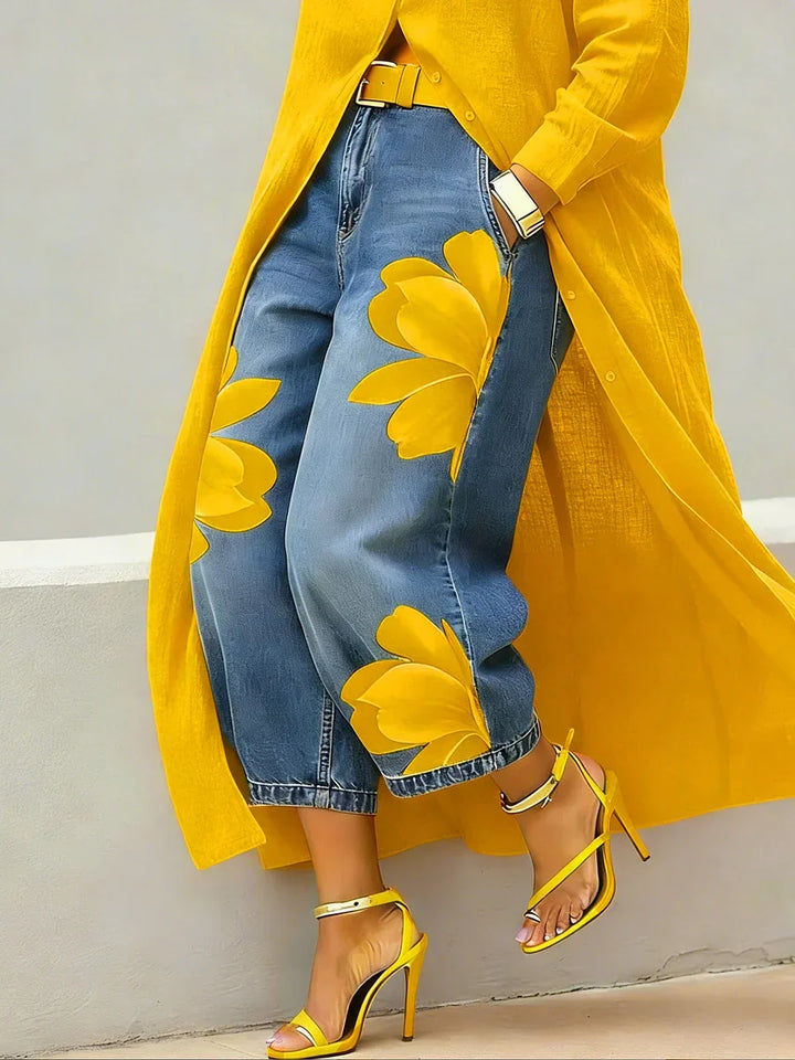 Back view of longline shirt dress with floral jeans showing coordinated layering effect