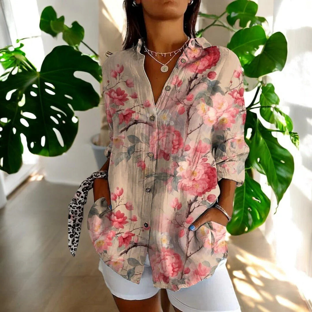 Relaxed fit floral blouse with oversized botanical print and three-quarter sleeves