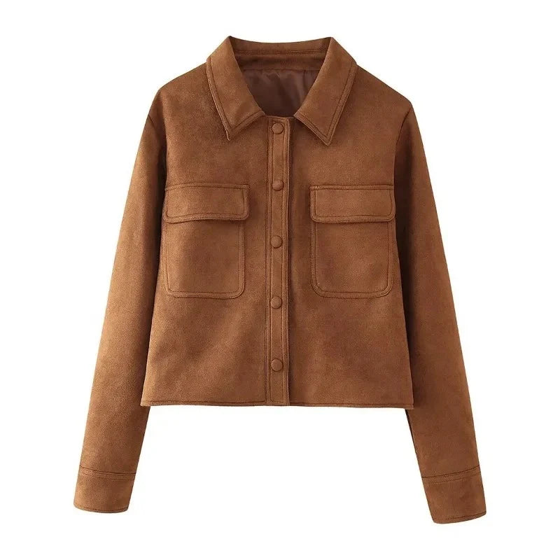Close-up of women's suede shirt jacket showing collar detail and button closure