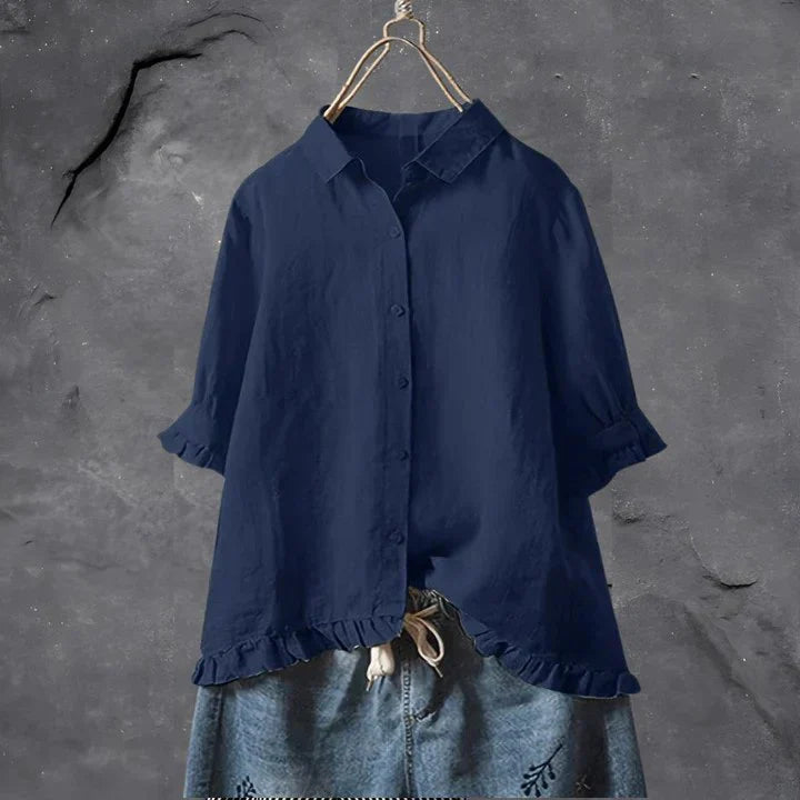 Relaxed fit women's linen shirt with ruffle sleeve detail and classic button-down front closure