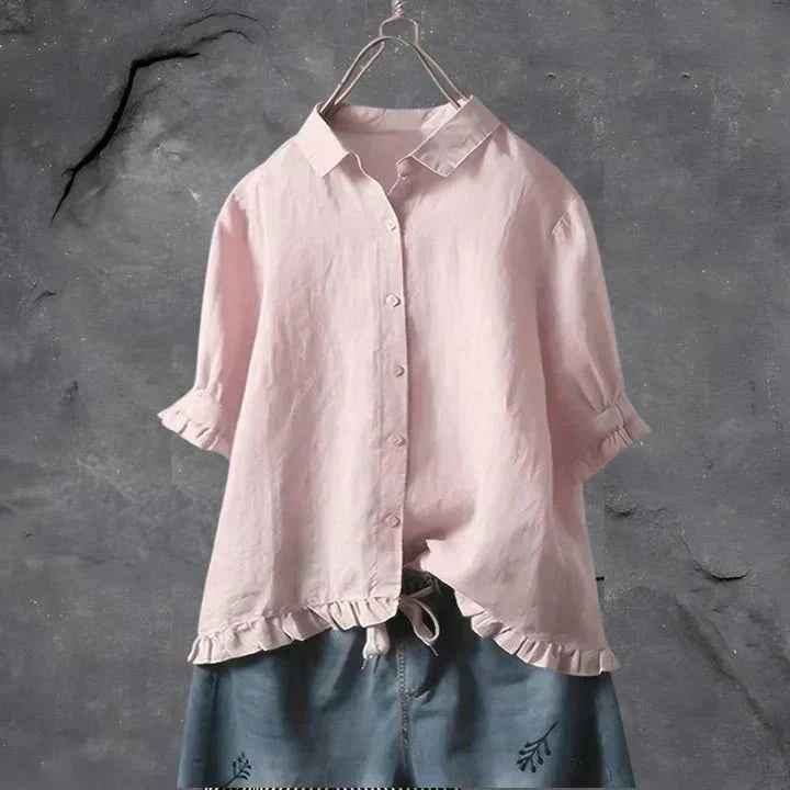 Oversized linen button-down shirt for women featuring delicate ruffle trim along sleeve edges