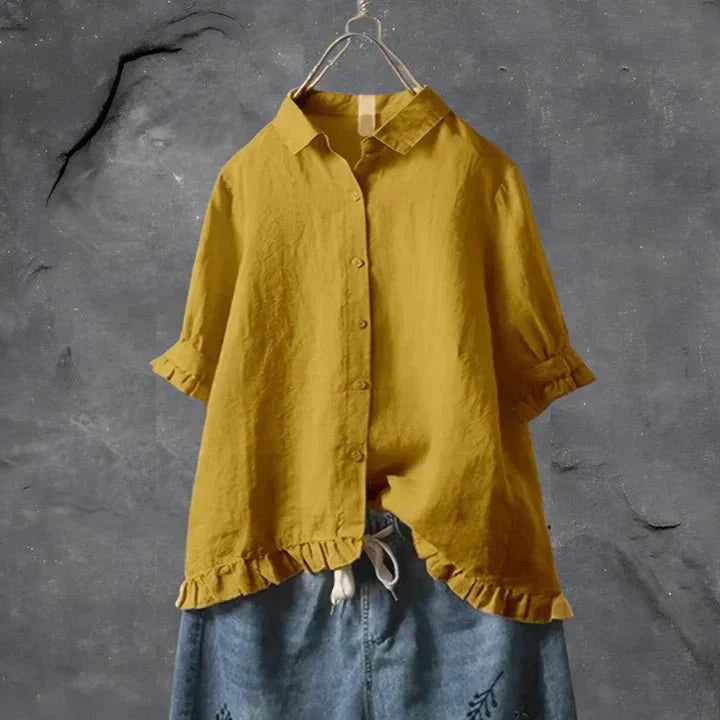 Women's lightweight linen shirt with ruffle detailing and structured collar for warm-weather styling