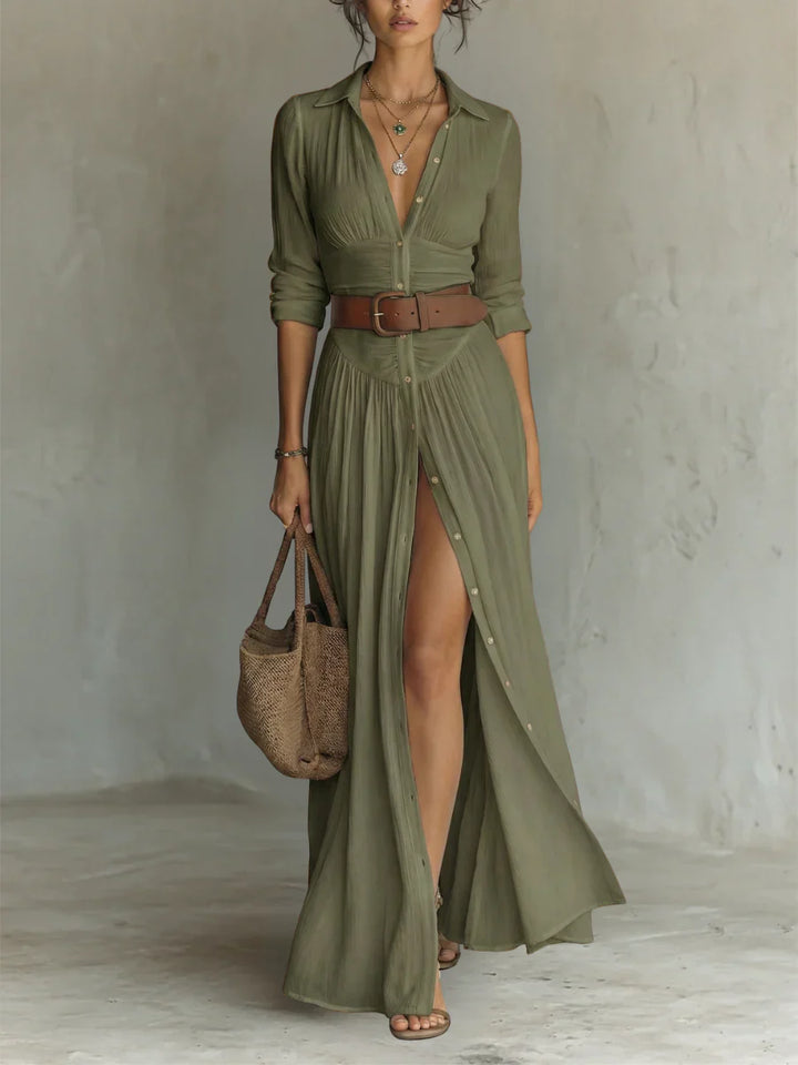 Full-length view of pleated maxi shirt dress showing floor-length hem and elegant drape