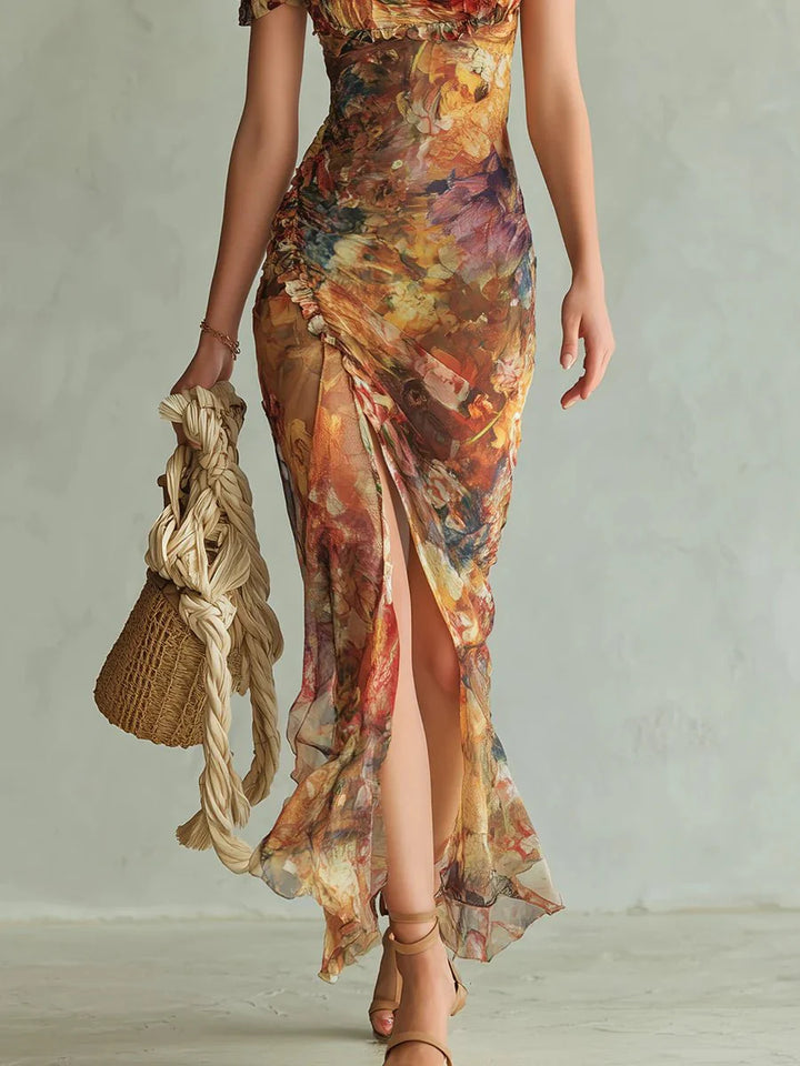 Detail shot of ruched bodice and lightweight semi-sheer fabric on floral print sweetheart maxi dress