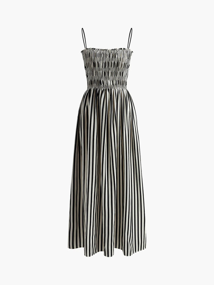 Back view of sleeveless pinstripe long dress revealing open back and adjustable strap detailing