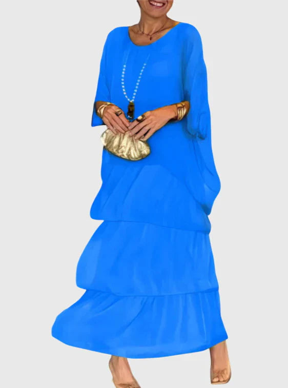 Layered maxi shorts dress with round neckline and flowing tiers for artistic everyday styling