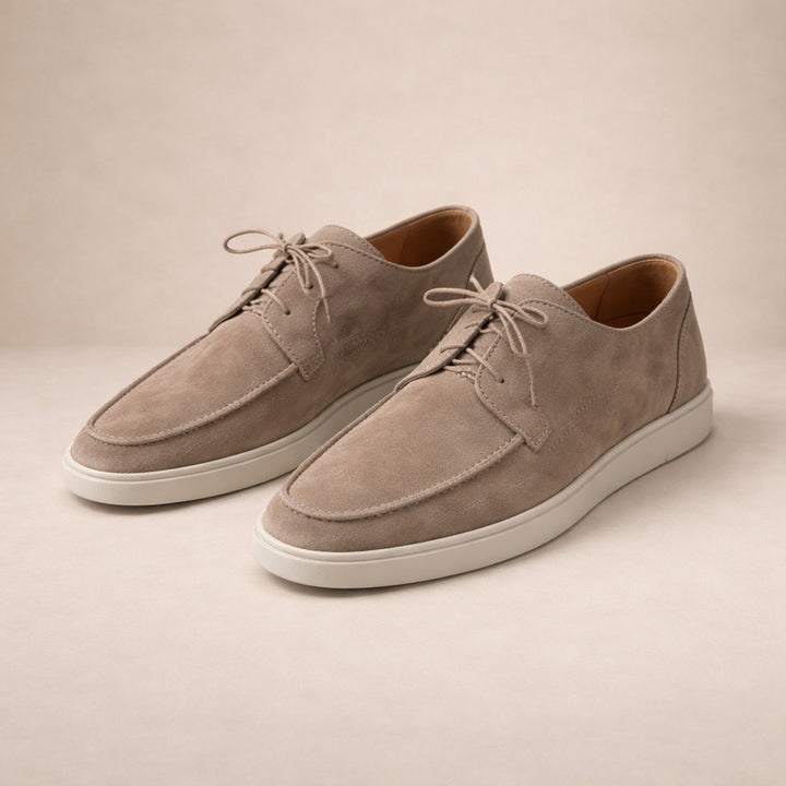 Men's lace-up moc-toe shoes in taupe, pair shown at an angle