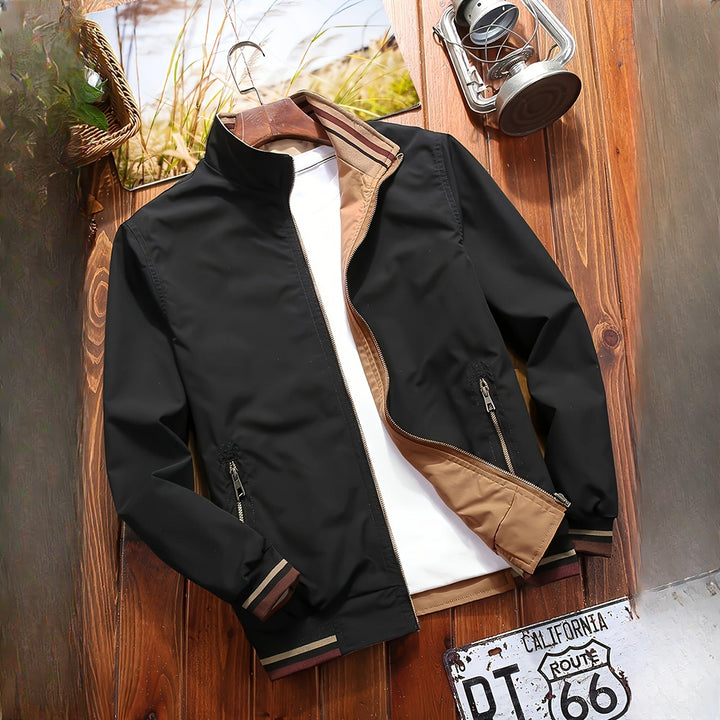 Men's reversible bomber jacket in black, styled view