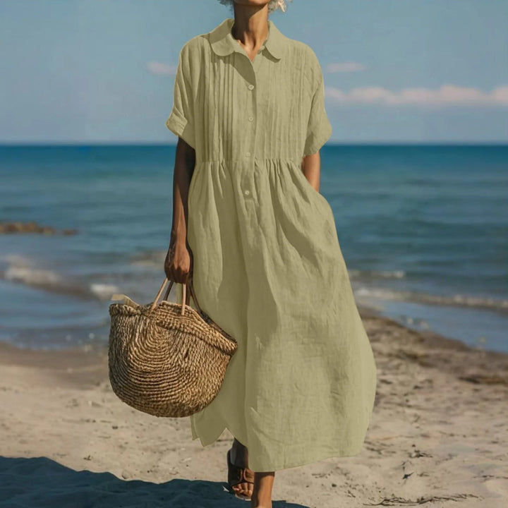 Casual styling of white collared midi dress for warm-weather occasions