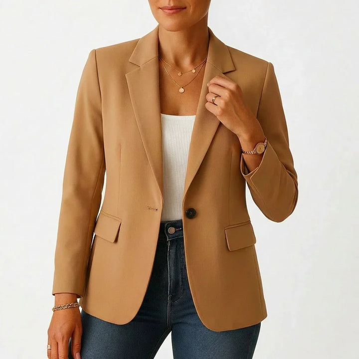Back view of fitted blazer showing centre vent and structured seams
