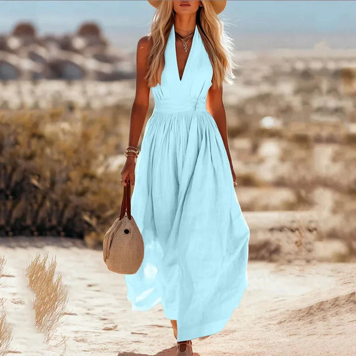 Halter neck maxi dress with tie closure and relaxed skirt, ideal for warm weather