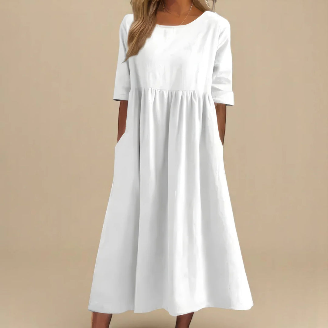 Relaxed midi dress styled for casual everyday wear with comfortable fit