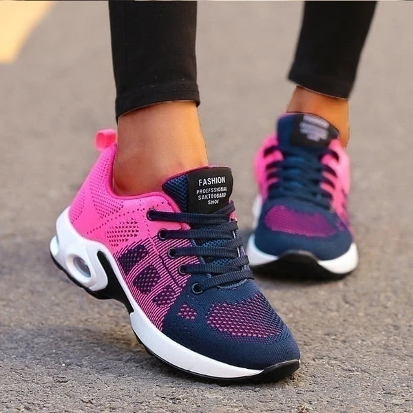 Women's Knit Casual Lace-Up Everyday Sneakers worn with black leggings on wooden deck