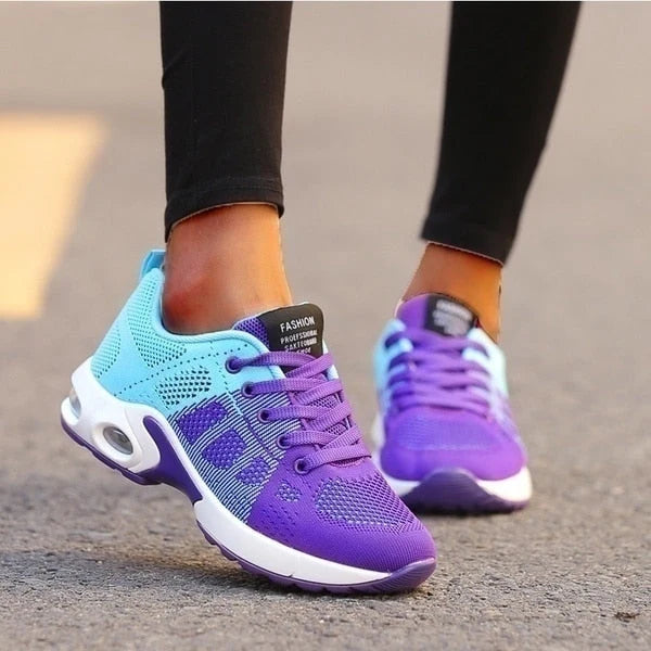 Rear view of Women's Knit Casual Lace-Up Everyday Sneakers showing cushioned heel and branded tab
