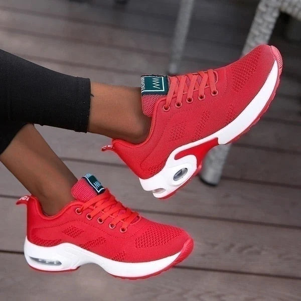 Full view of Women's Knit Casual Lace-Up Everyday Sneakers displaying low-top silhouette and sporty design