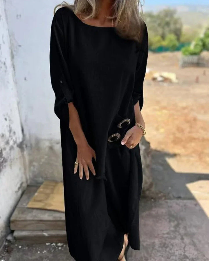 Full-length view of the two-piece set showing the relaxed silhouette and matching trousers