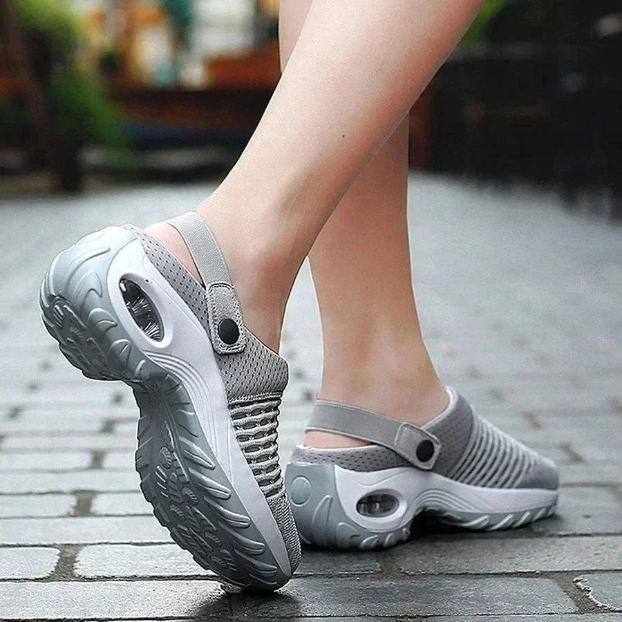 Air-cushioned shoes with strong cushioning for diabetics featuring grey slip-on design with textured sole and adjustable strap