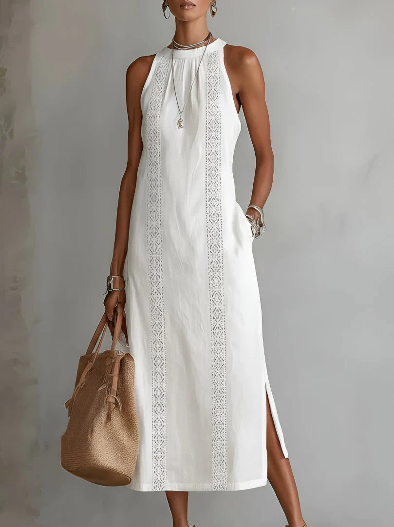 Close-up view of embroidered front panel detail on sleeveless midi dress