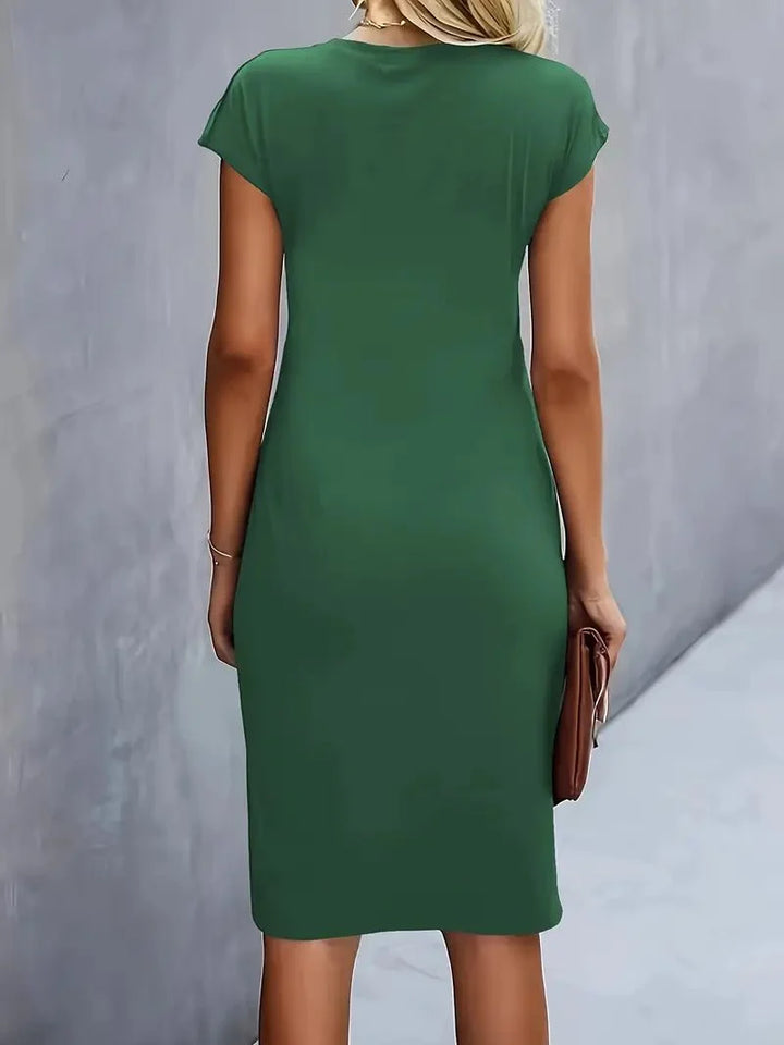 Knee-length bodycon dress with twist-ruched waist for office and evening