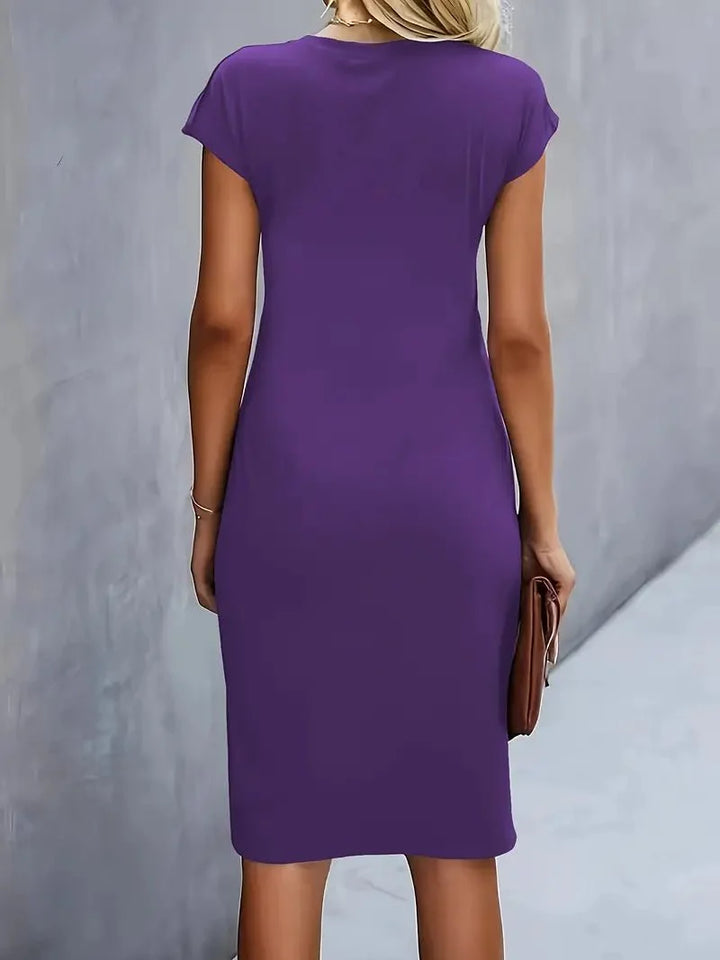 Bodycon midi dress with sculptural waist detail and below-the-knee hem