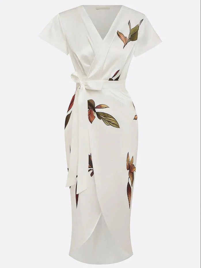 Back view of floral wrap midi dress showing tie waist and drape