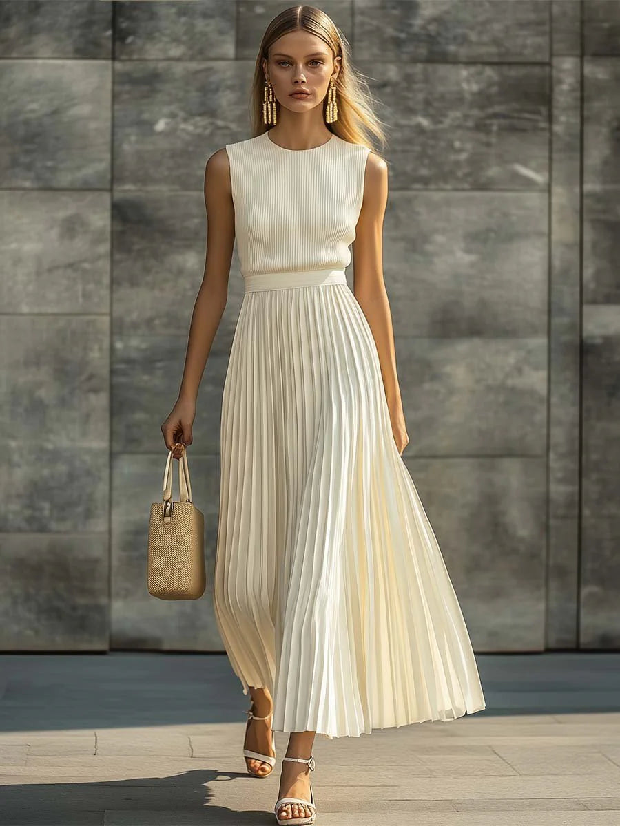 Close-up view of sleeveless ribbed pleated maxi dress showing crew neckline and ribbed knit bodice detail