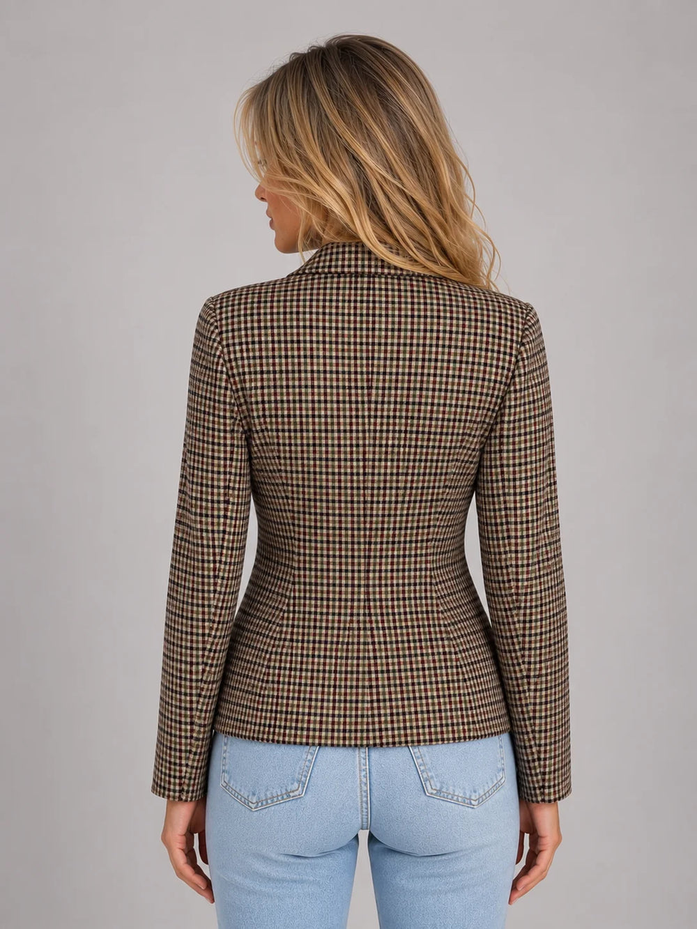 Front view of women's checked blazer showing double breasted button closure and structured silhouette