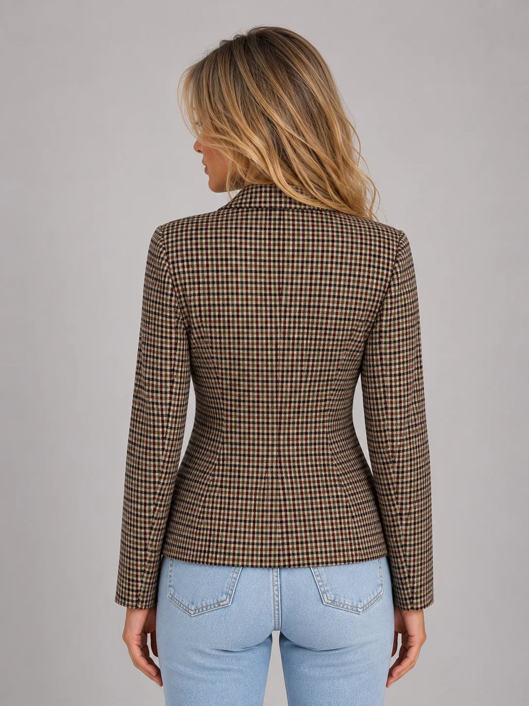 Front view of women's checked blazer showing double breasted button closure and structured silhouette