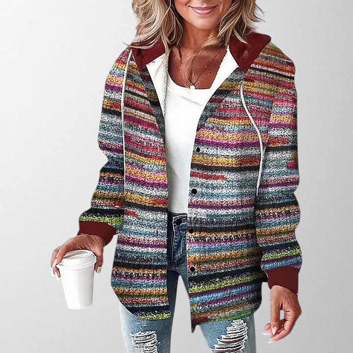 Full-length view of women's check overshirt jacket showing relaxed silhouette and functional hood design