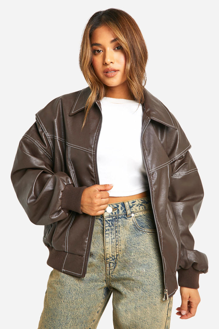 Woman in classic bomber jacket demonstrating oversized fit and contemporary silhouette