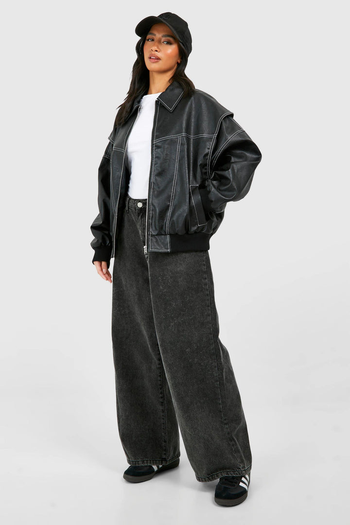 Back view of classic bomber jacket displaying oversized silhouette and contrast stitching detail