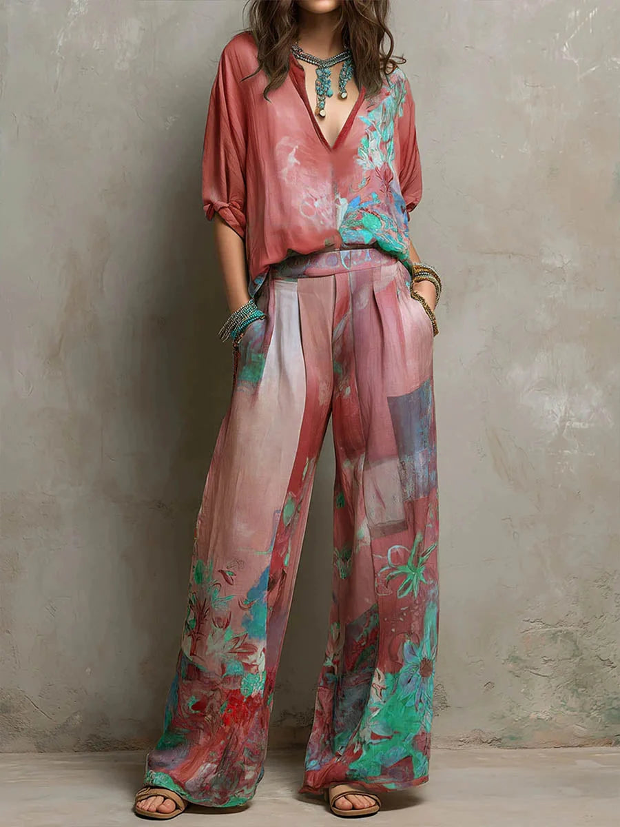 Flowing wide-leg trousers and V-neck top in turquoise floral print for warm-weather wear