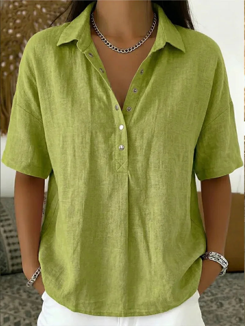 Detail of classic collar and chest pocket on women's linen shirt