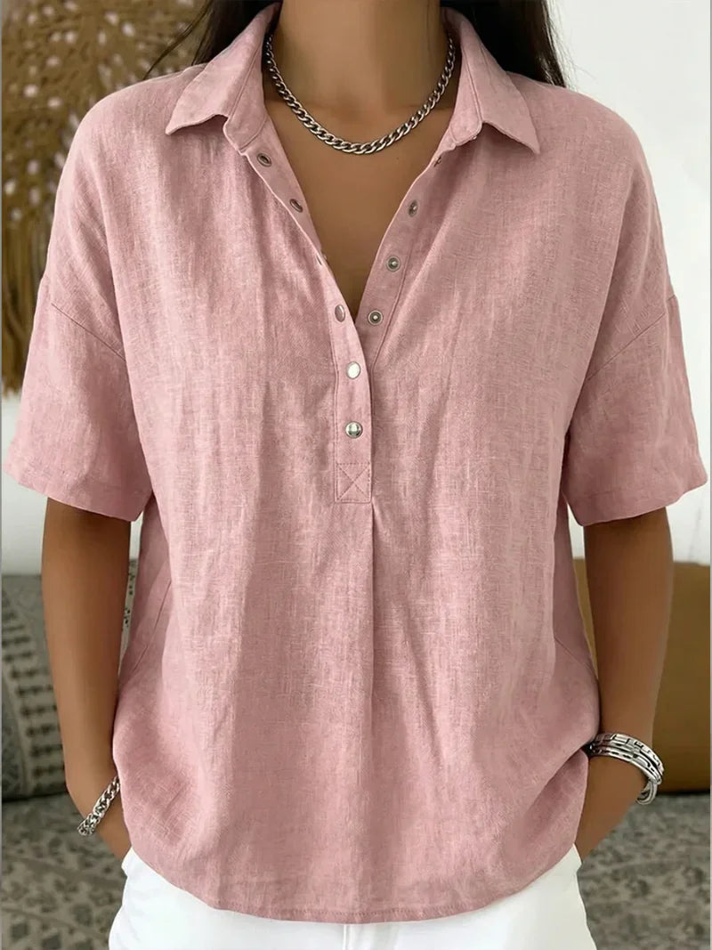 Back view of women's linen shirt showing relaxed fit and shoulder drape