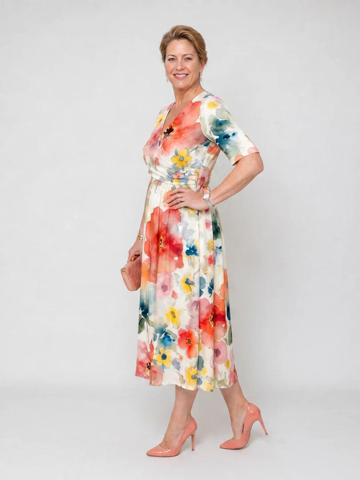 Side view of floral midi dress highlighting relaxed A-line silhouette and mid-calf length