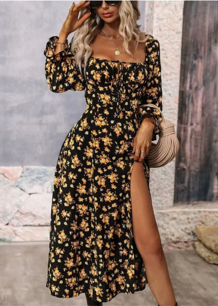 Woman wearing floral midi dress styled with wide-brim hat for garden party