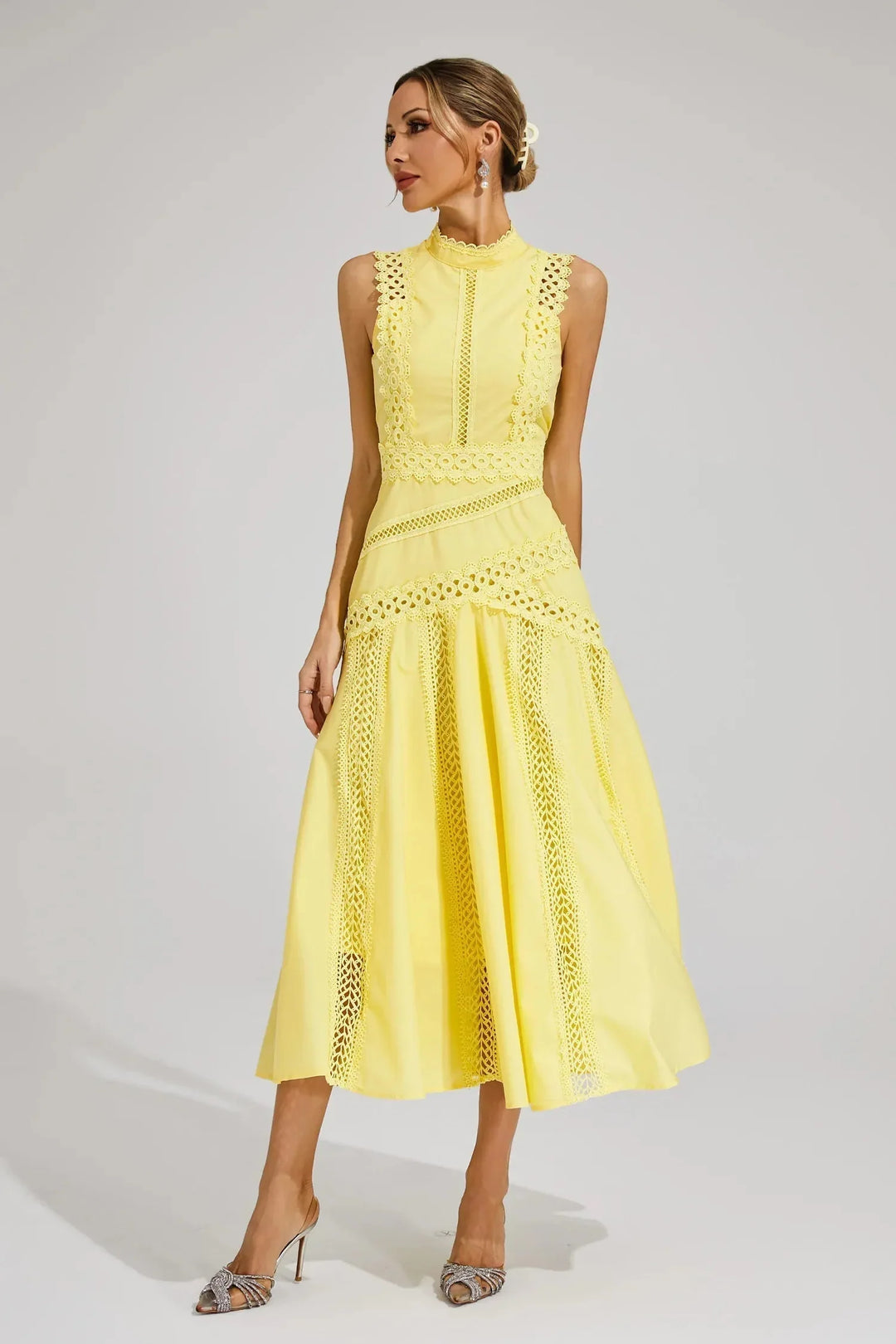 Full-length view of wedding guest midi dress with fitted bodice and flowing skirt