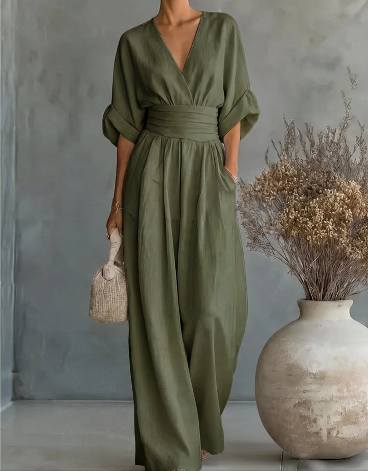 Brown wide-leg jumpsuit with wrap bodice and short sleeves