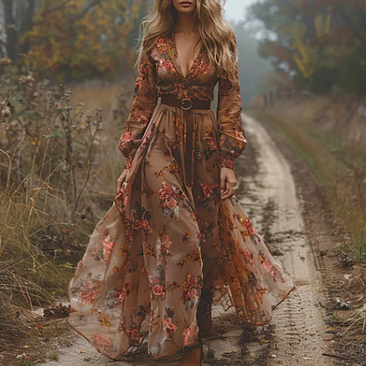 Full-length view of Women's Floral Long Sleeve Maxi Dress with tiered hem and gathered cuff sleeves