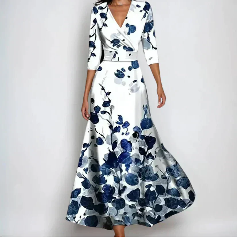 Close-up of floral wrap maxi dress showing three-quarter sleeves and waist-tie detail