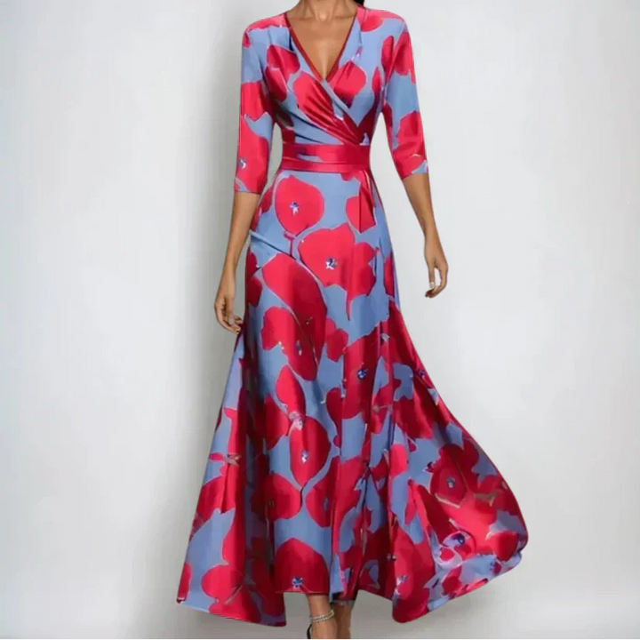 Side view of floral wrap maxi dress displaying flowing A-line skirt and botanical pattern