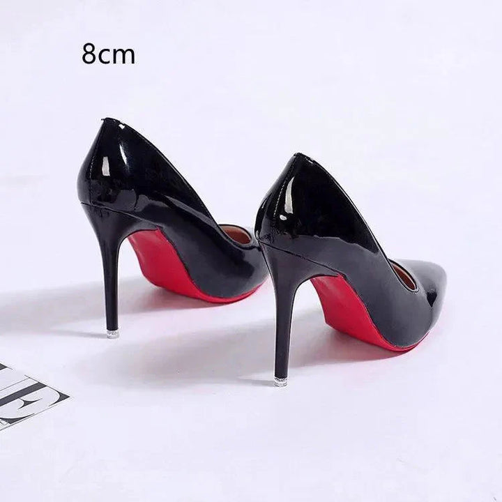 Pointed toe stiletto heels styled for office wear with tailored trousers