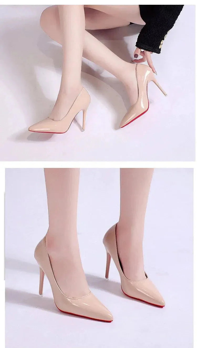 Detail of tapered stiletto heel and pointed toe shape on glossy patent heels