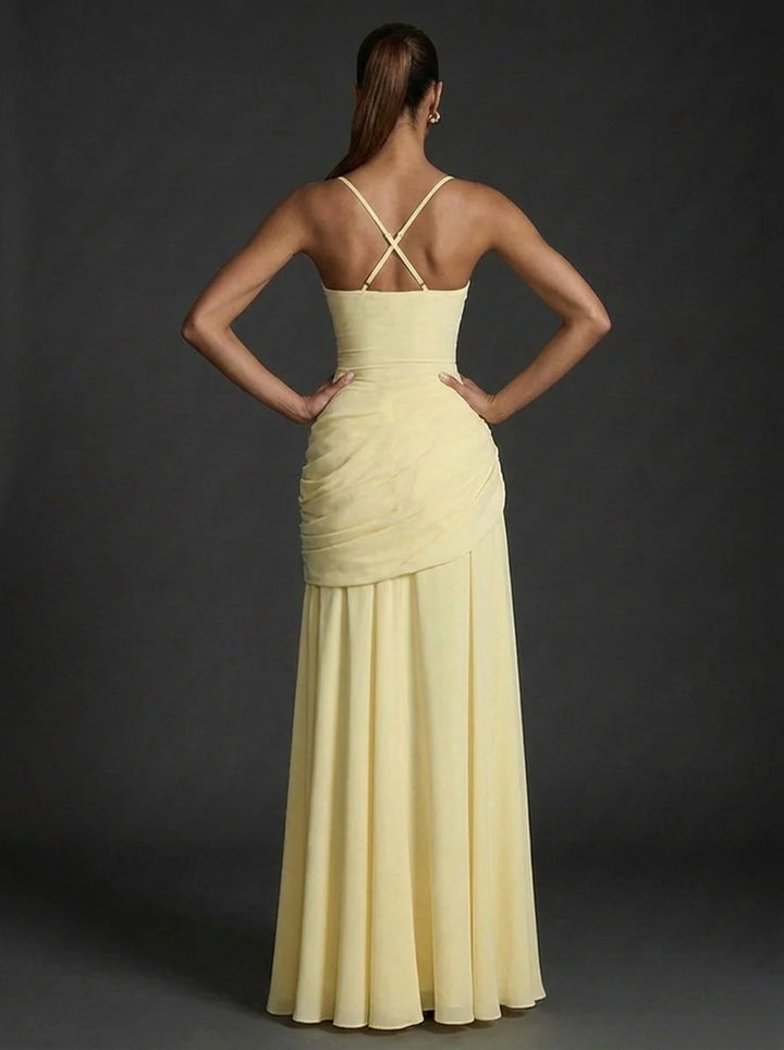 Back view of ruched maxi dress with wide shoulder straps and elegant draping