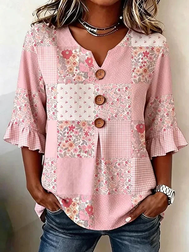 Side view showing the relaxed silhouette and flared three-quarter sleeves of the Women's Bohemian Floral Button Blouse
