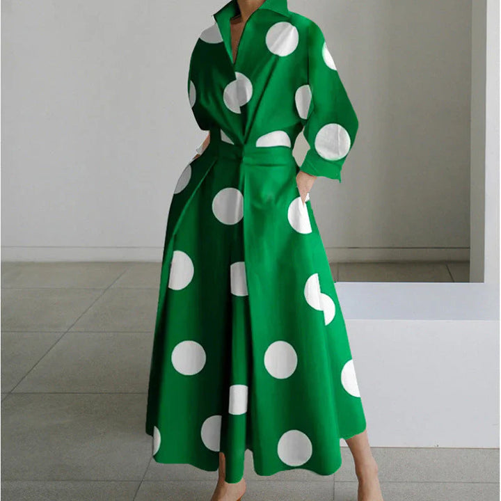 Collared wrap maxi dress showing movement and drape of flowing maxi-length skirt