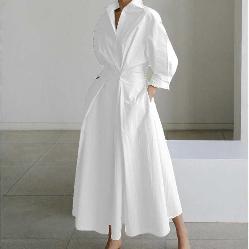 Collared wrap maxi dress featuring newspaper print with graphic illustrations and text elements