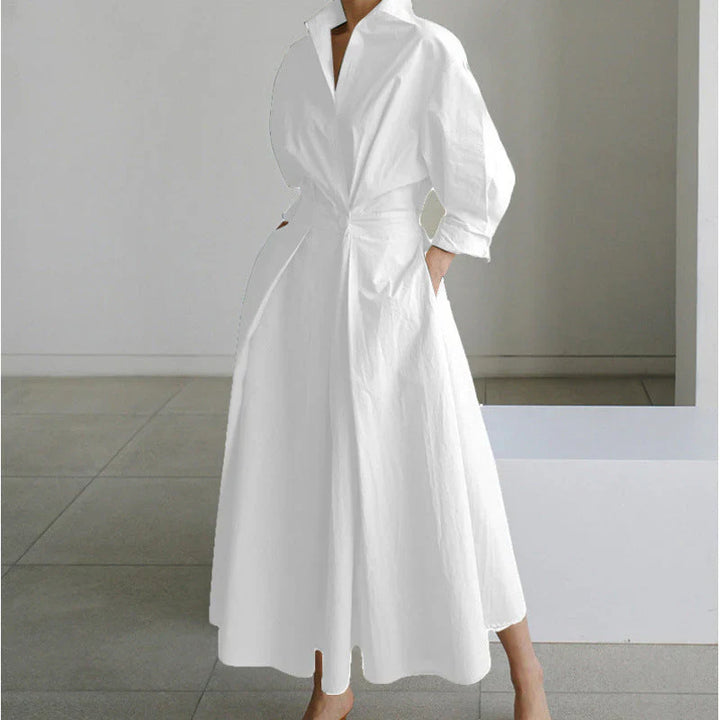 Collared wrap maxi dress featuring newspaper print with graphic illustrations and text elements